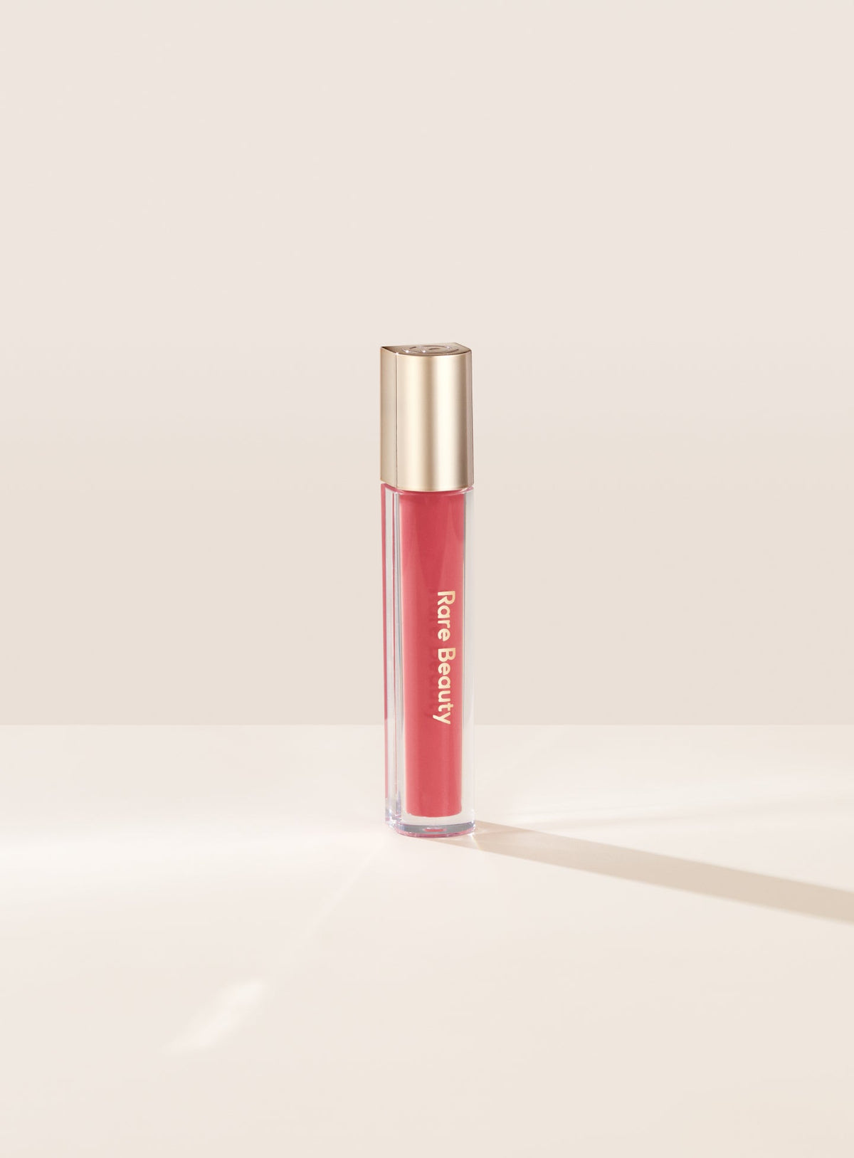 RARE BEAUTY Stay Vulnerable Glossy Lip Balm